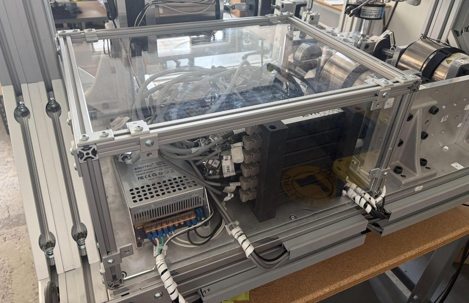 Autocalibration fixture electrical component enclosure